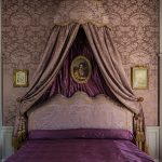 One of the opulent bedrooms at the stunning French wedding venue, Château de Villette