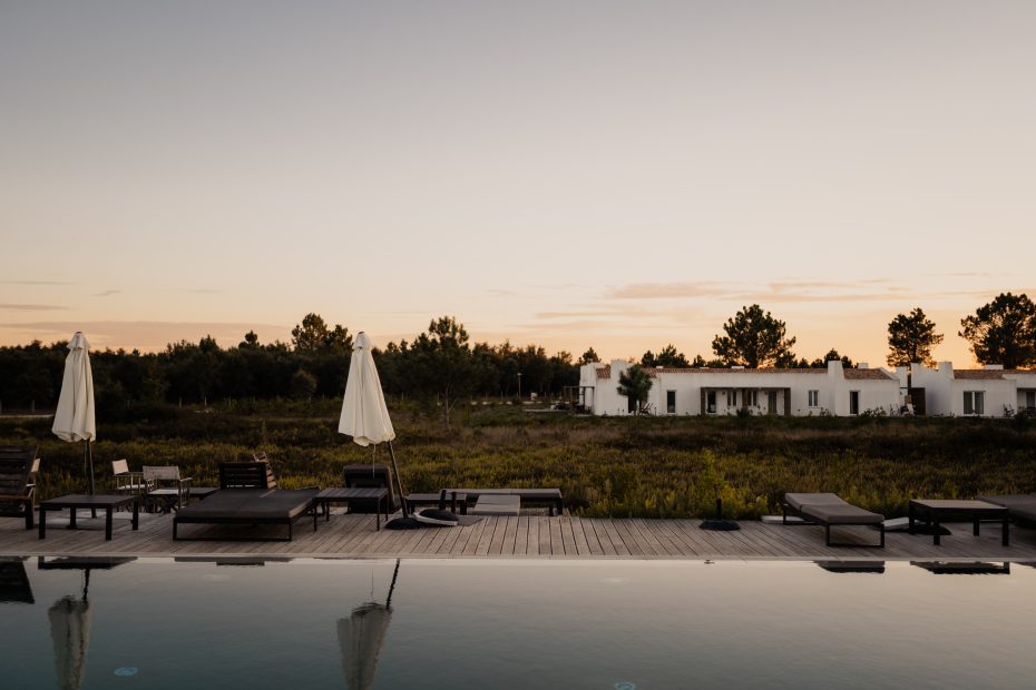 another aspect of the outdoor pool area at craveiral farmhouse wedding venue in portugal