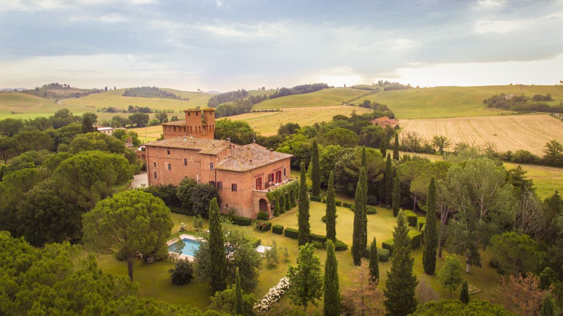 Aerial shot up over wedding venue castle di san Fabiano in Italy