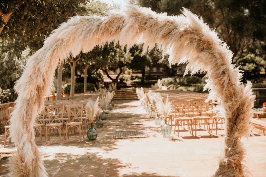 pampas grass archway for a wedding ceremony at Son Doblons wedding venue in mallorca spain