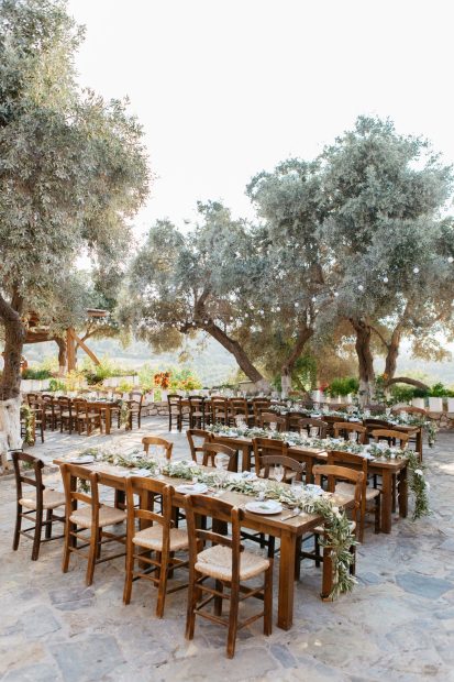 Rustic and elegant wedding reception setup at St. Nicolas church at Grecotel Agreco Farm Rethymno Crete.