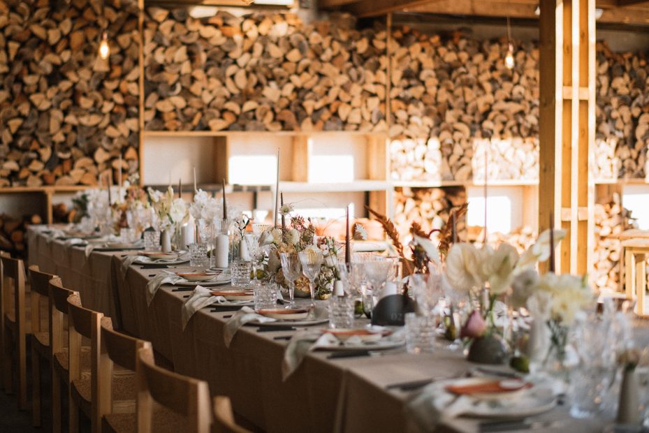 wedding reception tables laid up with a neutral theme for wedding at craveiral farmhouse in portugal