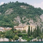 villa cipressi lake como wedding venue with mountains behind