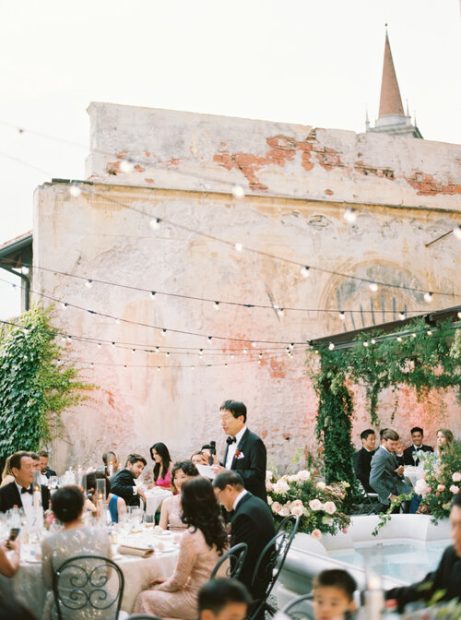 Father of the bride making a toast outside at Italian wedding venue Villa Cipressi