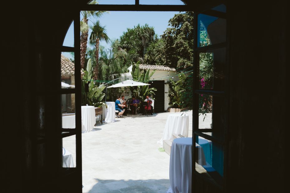 view out the double doors at spanish wedding venue Masia Victoria