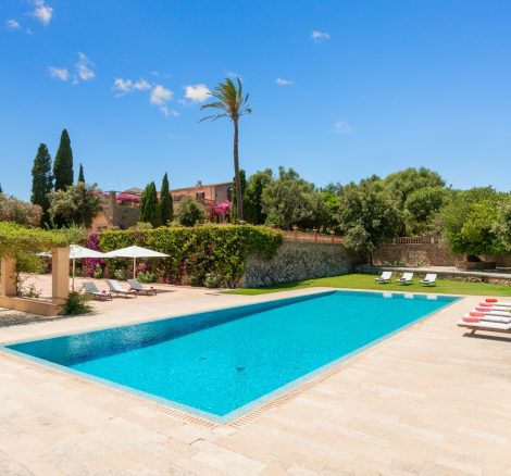 a side angle of the pool area at son doblons spanish wedding venue in mallorca