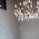 chandelier hanging from the ceiling at spanish wedding venue Masia Victoria