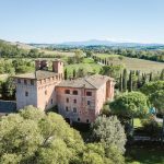 aerial view of unique Italian wedding venue Castello di San Fabiano nestled amongst the Italian countryside