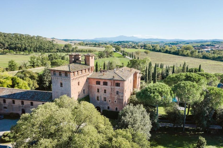 aerial view of unique Italian wedding venue Castello di San Fabiano nestled amongst the Italian countryside