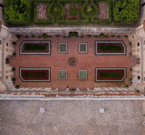 Aerial view above courtyard with walled garden at Italian wedding venue