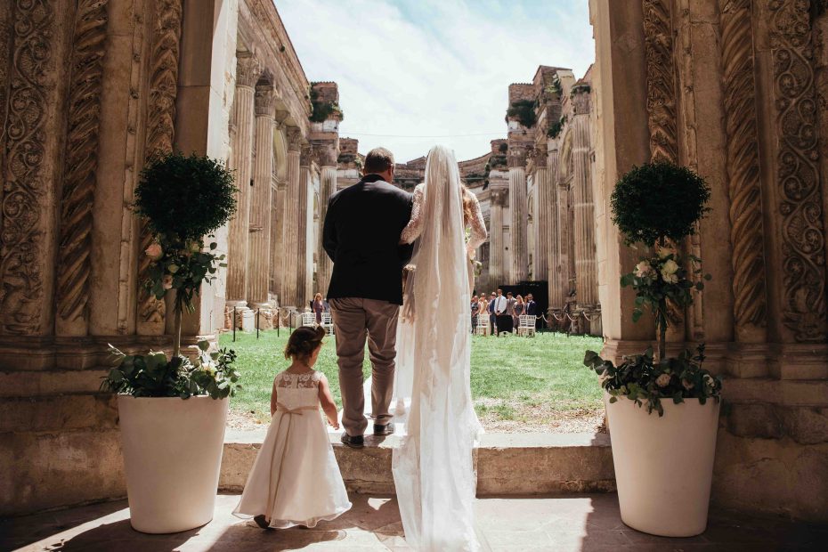 bride and father of the bride about to walk down the aisle at Italian wedding ceremony in a 500 year old palazzo