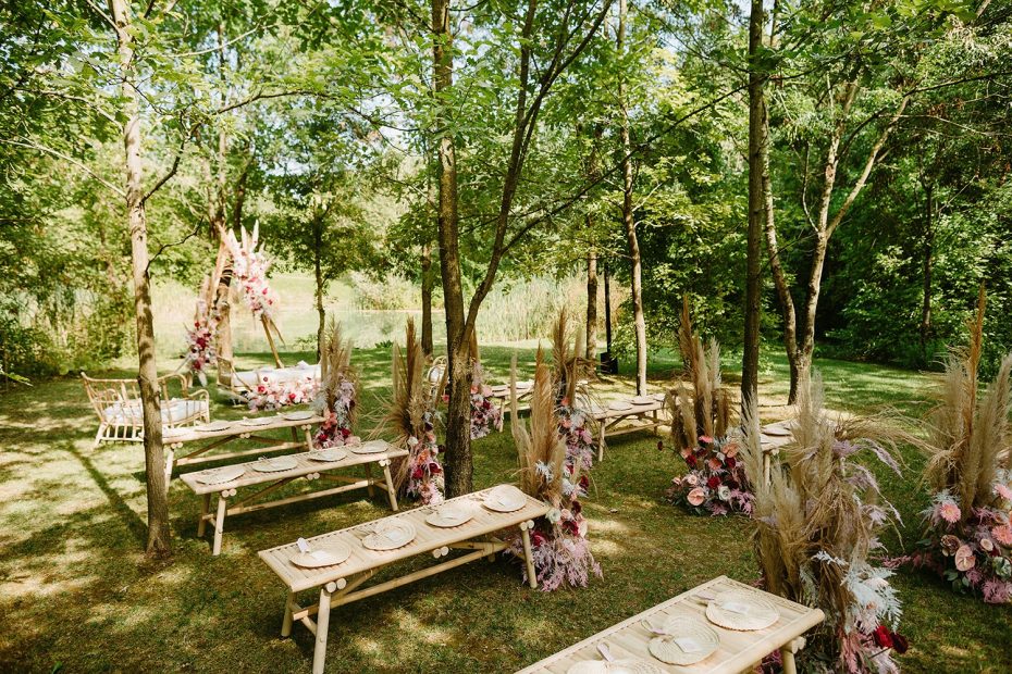 wooden benches lined with colour pop florals at Italian wedding venue convento dell'Annunciata