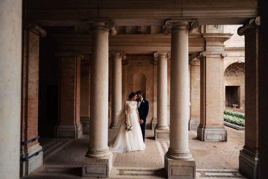 bride and groom on the historic grounds of Italian wedding venue Villa Imperiale