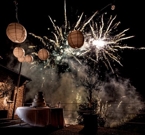 Fireworks at night on the grounds of Italian country estate wedding venue Le Stonghe