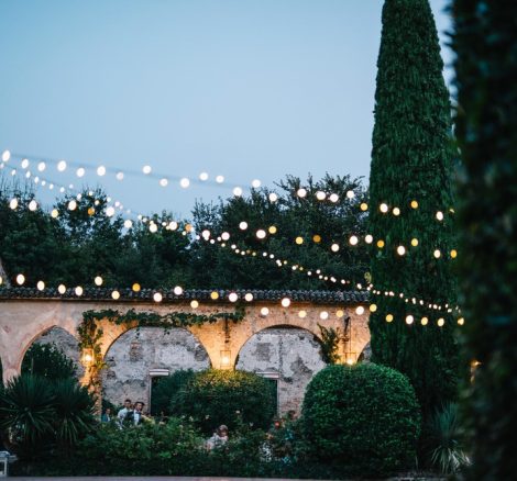 fairy lights strewn across the lawn at Italian wedding venue convento dell'Annunciata