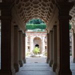 Villa Imperiale estate grounds with stone archways