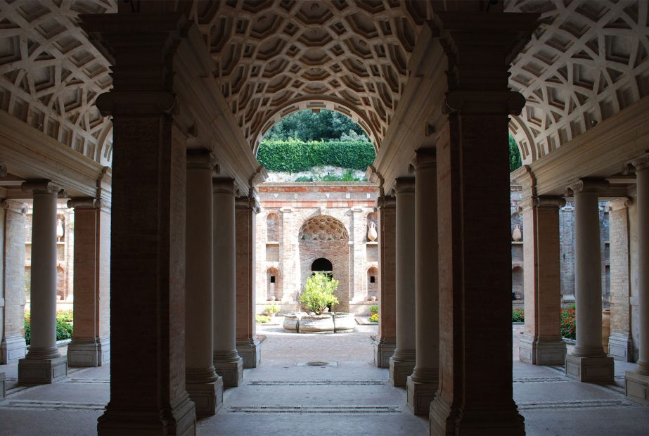 Villa Imperiale estate grounds with stone archways