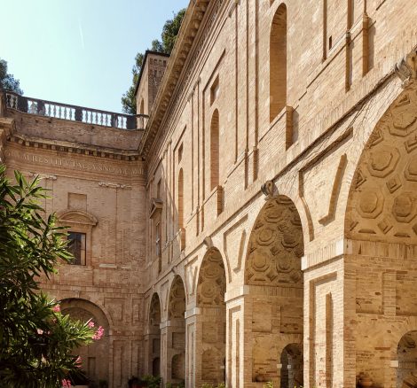 Arched stone cloisters at Italian wedding venue Villa Imperiale Pesaro