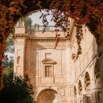 View through the stone archway at Italian wedding venue Villa Imperiale Pesaro