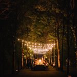 fairy lights draping a wedding reception in the forest at Italian wedding venue convento dell'Annunciata