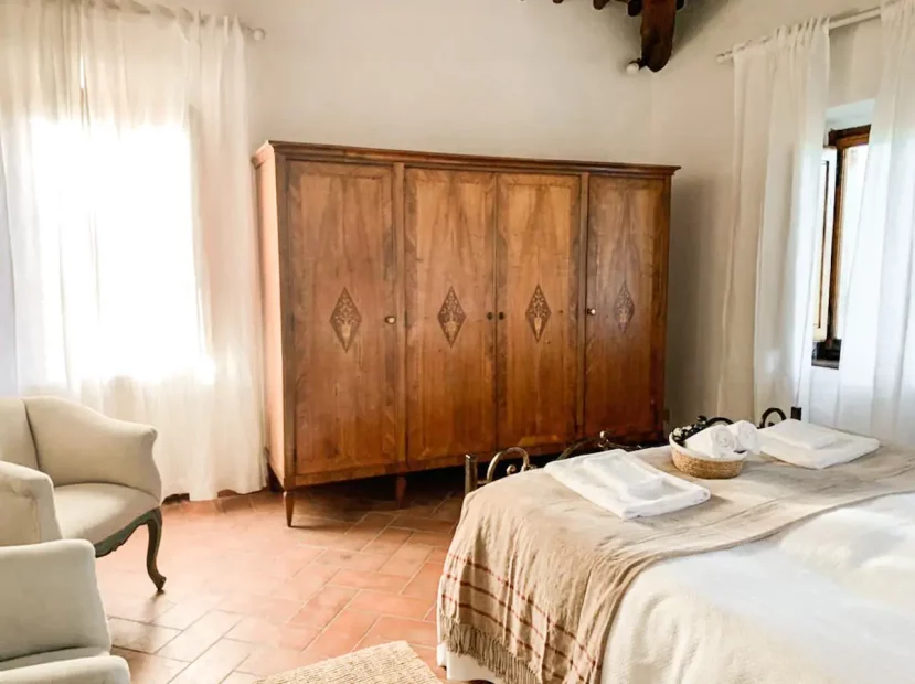 wooden wardrobe in gust suite at Italian wedding venue Antico convento i cappuccini di montalcino