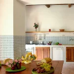 kitchen with tiled walls at Italian wedding venue Antico convento i cappuccini di montalcino