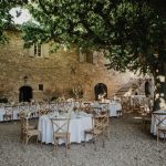 wedding tables set up for wedding breakfast at le Petit Roulet wedding venue in luberon in france