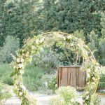 floral circular arch for wedding at French wedding venue le petit roulet