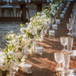 long wooden wedding tables set up at wedding venue in Cyprus liopetro