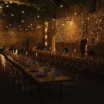 dining al fresco at sundown at le Petit Roulet wedding venue in luberon in france
