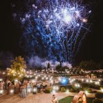bride and groom stood together admiring fireworks at wedding venue in Cyprus liopetro