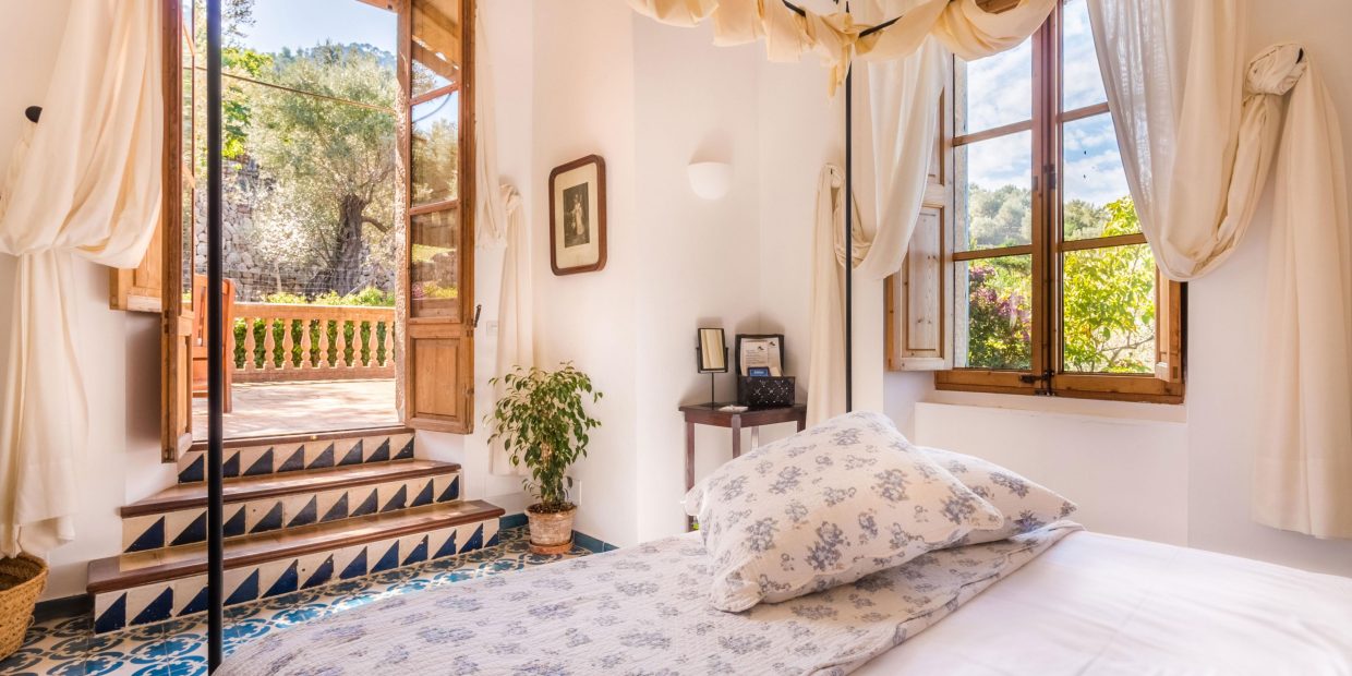 bedroom suite with traditional Mallorca features at Mallorca wedding venue ca's xorc in soller