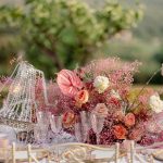 flower decor on tables at wedding venue in Tuscany Italy Borgo Stomennano