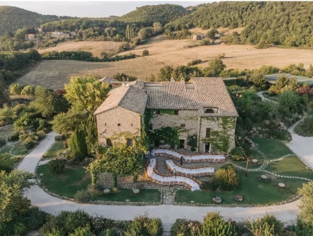drone shot of wedding venue Castello di Petrata with dining tables out front