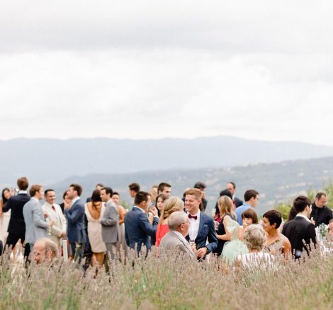 wedding guests mingling outdoors at le grand banc luxury destination wedding venue in france