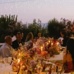 Image of dining tabel with flowers and drinks at wedding venue Castello di Petrata
