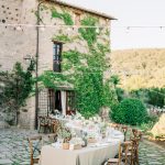 winding curved wedding tables at wedding venue in italy castello di petrata