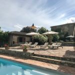 poolside at wedding venue in Tuscany Italy Borgo Stomennano
