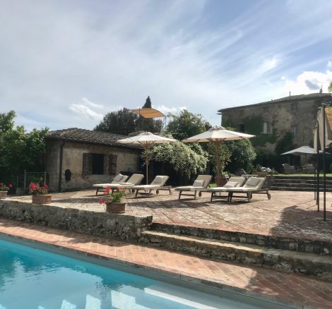 poolside at wedding venue in Tuscany Italy Borgo Stomennano