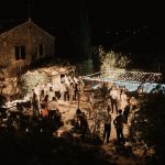 evening wedding party outdoors at wedding venue in Tuscany Italy Borgo Stomennano