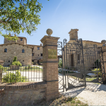 gated entrance to 13th century private estate at wedding venue Borgo Castello Panicaglia