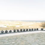 long walled seating area at the secret view wedding venue in paros greece