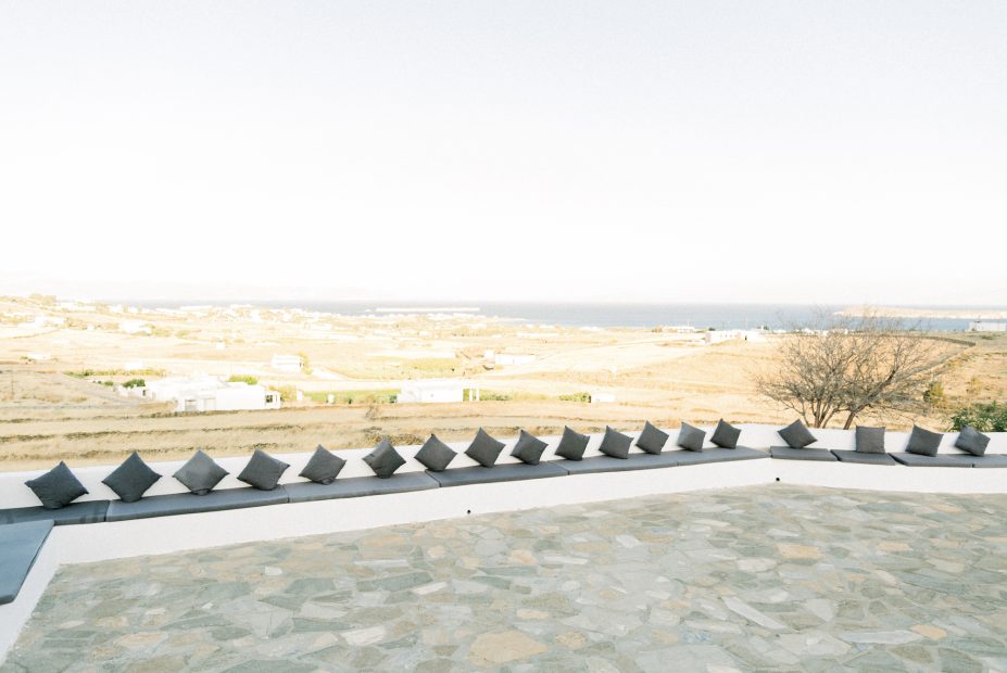 long walled seating area at the secret view wedding venue in paros greece