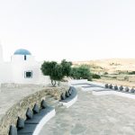 wide angle shot of the large outdoor area for a wedding at the secret view wedding venue in paros greece
