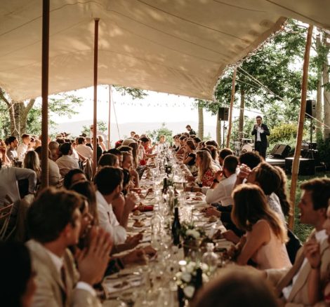wedding guests dining in open air marquee at le grand banc luxury destination wedding venue in france