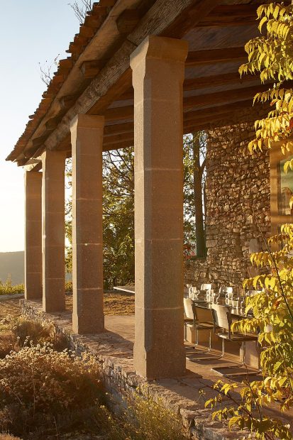 outside pillars undercover seating area at le grand banc luxury destination wedding venue in france