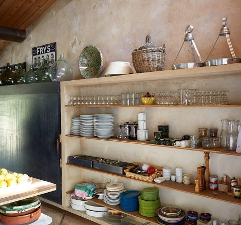 kitchen shelf stacked with supplies at le grand banc luxury destination wedding venue in france
