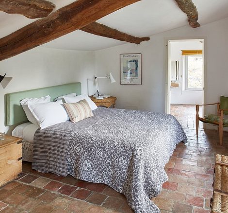 bedroom suite with wooden beams at le grand banc luxury destination wedding venue in france
