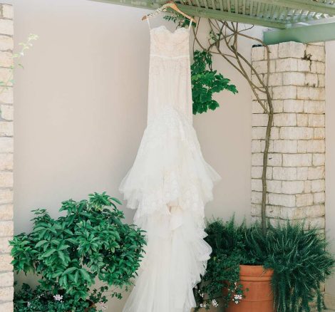 brides dress hung outside at wedding venue villa in corfu Greece at villa Sylva