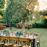 wedding tables and firelight tree at wedding venue villa in corfu Greece at villa Sylva